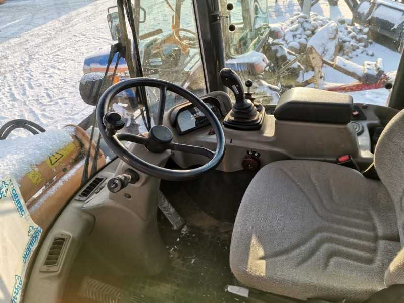 Case 21E (šarnyrinis krautuvas)