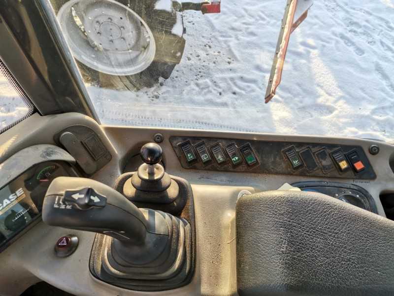 Case 21E (šarnyrinis krautuvas)