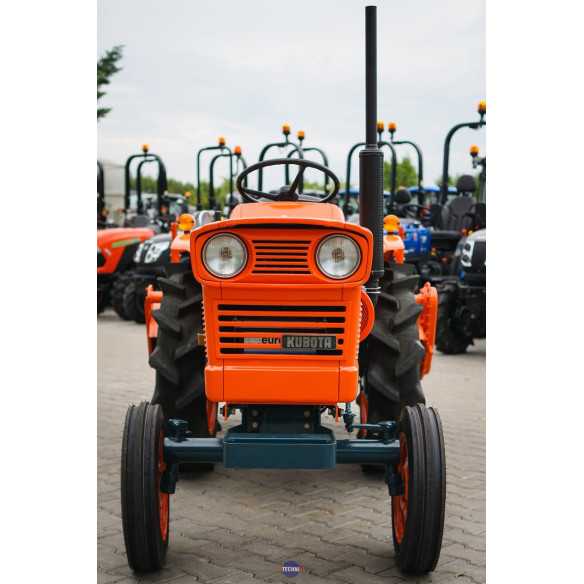 Kubota L-1501 (2wd) su žemės dirbimo freza