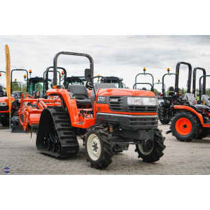 Kubota GT-21 su žemės dirbimo freza
